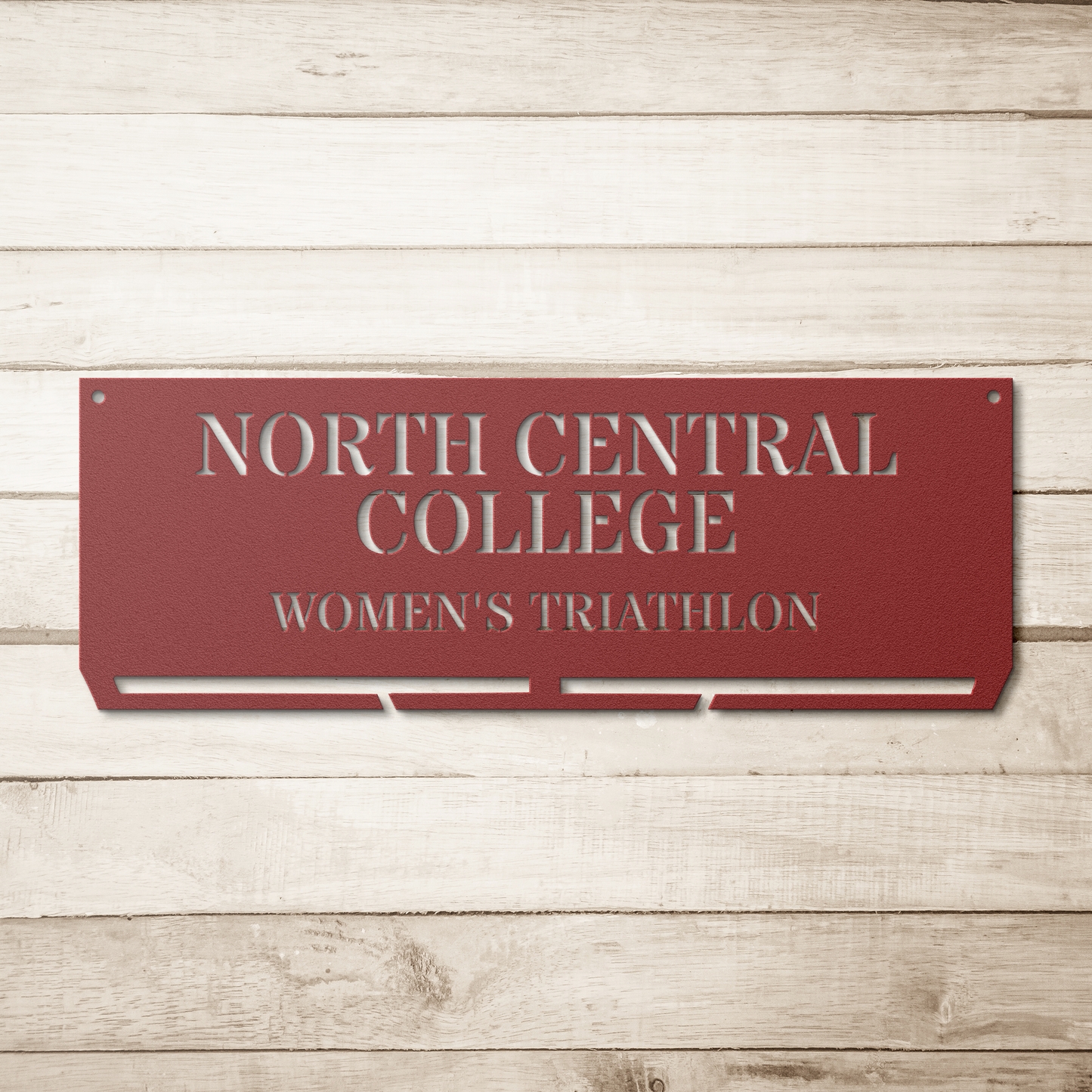 NCC_TRI_25_Metal-Die_Cut_Medal_Hanger_Red_Simple_Wood_BKGD_Mockup.png